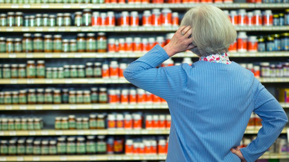 a woman in a shop looking for the Best supplements for lowering blood pressure